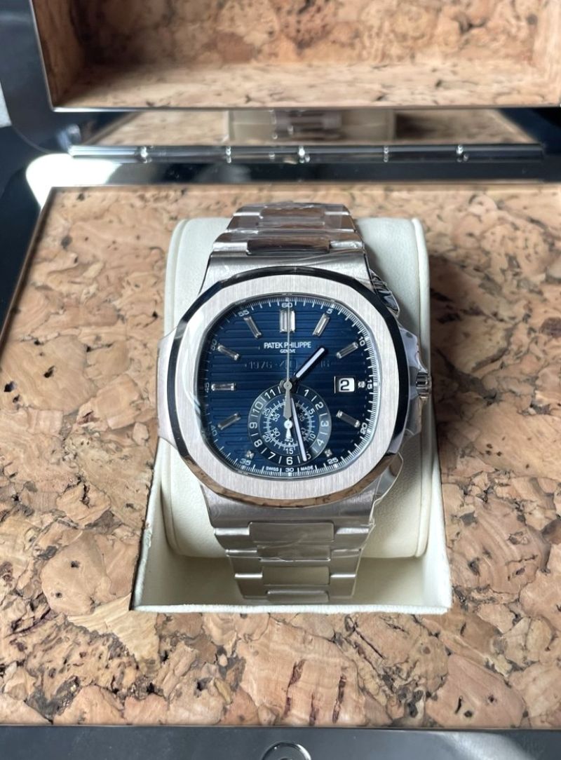 photo_2025-03-11_10-17-57_b8b2f880-6a3e-4f6a-b0c4-3e896163047d 2017 Patek Philippe Nautilus 40th Anniversary 5976/1G-001 - Image 1